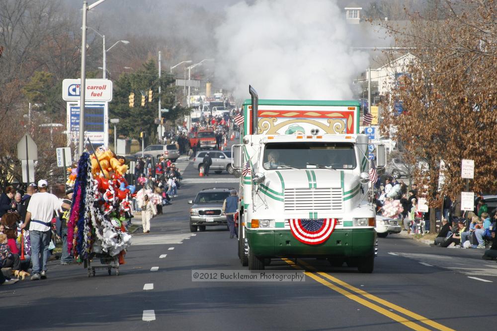 40th Annual Mayors Christmas Parade 2012\nPhotography by: Buckleman Photography\nall images ©2012 Buckleman Photography\nThe images displayed here are of low resolution;\nReprints available,  please contact us: \ngerard@bucklemanphotography.com\n410.608.7990\nbucklemanphotography.com\nFile Number - 2056.jpg