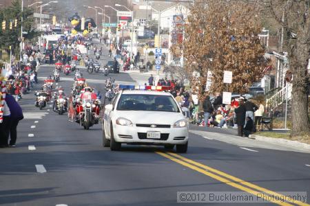 40th Annual Mayors Christmas Parade 2012\nPhotography by: Buckleman Photography\nall images ©2012 Buckleman Photography\nThe images displayed here are of low resolution;\nReprints available,  please contact us: \ngerard@bucklemanphotography.com\n410.608.7990\nbucklemanphotography.com\nFile Number - 2061.jpg