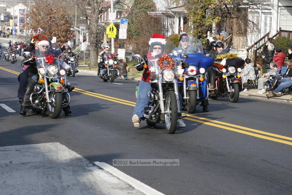 40th Annual Mayors Christmas Parade 2012\nPhotography by: Buckleman Photography\nall images ©2012 Buckleman Photography\nThe images displayed here are of low resolution;\nReprints available,  please contact us: \ngerard@bucklemanphotography.com\n410.608.7990\nbucklemanphotography.com\nFile Number - 2064.jpg