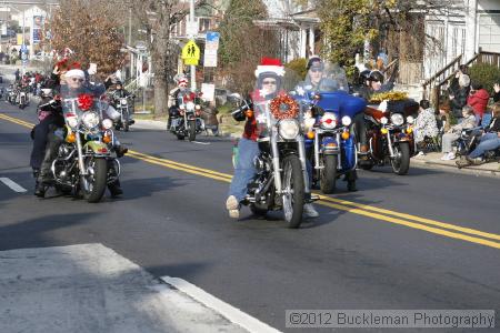 40th Annual Mayors Christmas Parade 2012\nPhotography by: Buckleman Photography\nall images ©2012 Buckleman Photography\nThe images displayed here are of low resolution;\nReprints available,  please contact us: \ngerard@bucklemanphotography.com\n410.608.7990\nbucklemanphotography.com\nFile Number - 2064.jpg