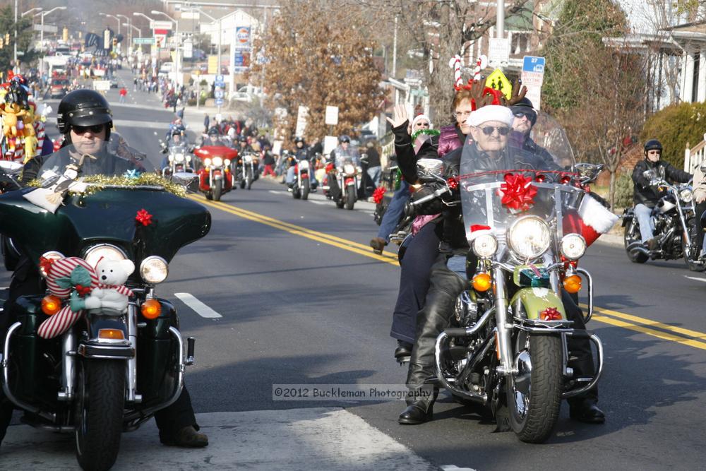 40th Annual Mayors Christmas Parade 2012\nPhotography by: Buckleman Photography\nall images ©2012 Buckleman Photography\nThe images displayed here are of low resolution;\nReprints available,  please contact us: \ngerard@bucklemanphotography.com\n410.608.7990\nbucklemanphotography.com\nFile Number - 2065.jpg