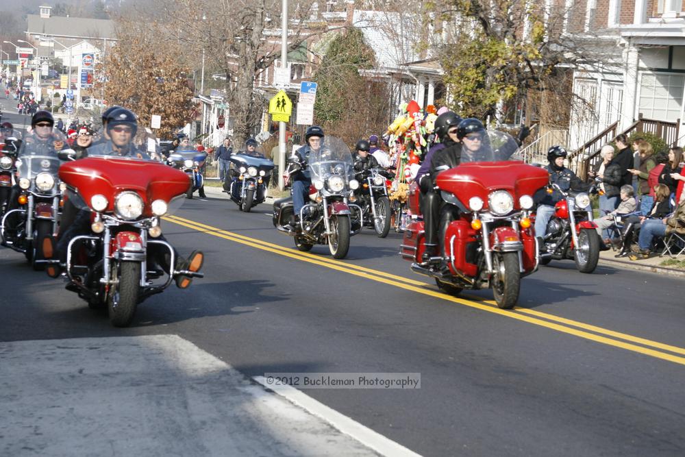 40th Annual Mayors Christmas Parade 2012\nPhotography by: Buckleman Photography\nall images ©2012 Buckleman Photography\nThe images displayed here are of low resolution;\nReprints available,  please contact us: \ngerard@bucklemanphotography.com\n410.608.7990\nbucklemanphotography.com\nFile Number - 2069.jpg