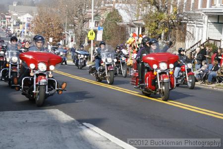 40th Annual Mayors Christmas Parade 2012\nPhotography by: Buckleman Photography\nall images ©2012 Buckleman Photography\nThe images displayed here are of low resolution;\nReprints available,  please contact us: \ngerard@bucklemanphotography.com\n410.608.7990\nbucklemanphotography.com\nFile Number - 2069.jpg