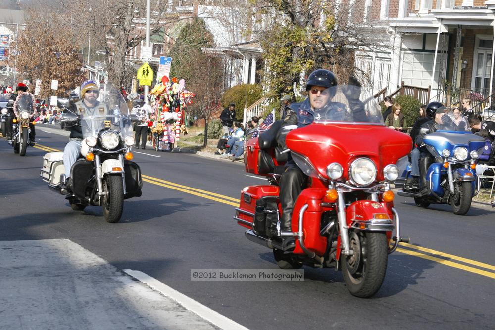 40th Annual Mayors Christmas Parade 2012\nPhotography by: Buckleman Photography\nall images ©2012 Buckleman Photography\nThe images displayed here are of low resolution;\nReprints available,  please contact us: \ngerard@bucklemanphotography.com\n410.608.7990\nbucklemanphotography.com\nFile Number - 2072.jpg