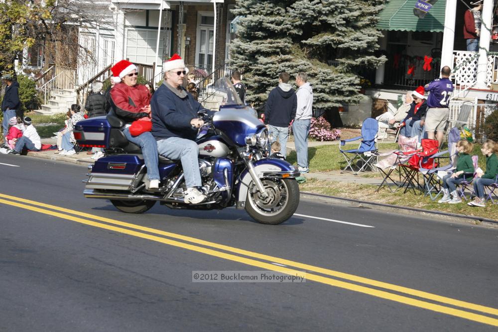 40th Annual Mayors Christmas Parade 2012\nPhotography by: Buckleman Photography\nall images ©2012 Buckleman Photography\nThe images displayed here are of low resolution;\nReprints available,  please contact us: \ngerard@bucklemanphotography.com\n410.608.7990\nbucklemanphotography.com\nFile Number - 2073.jpg