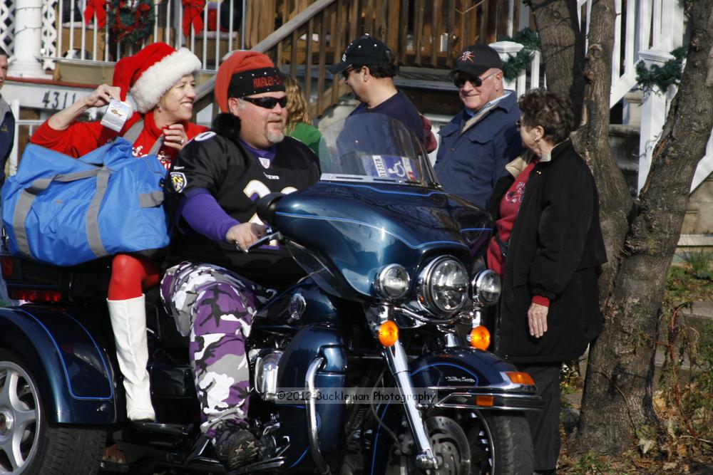 40th Annual Mayors Christmas Parade 2012\nPhotography by: Buckleman Photography\nall images ©2012 Buckleman Photography\nThe images displayed here are of low resolution;\nReprints available,  please contact us: \ngerard@bucklemanphotography.com\n410.608.7990\nbucklemanphotography.com\nFile Number - 2074.jpg