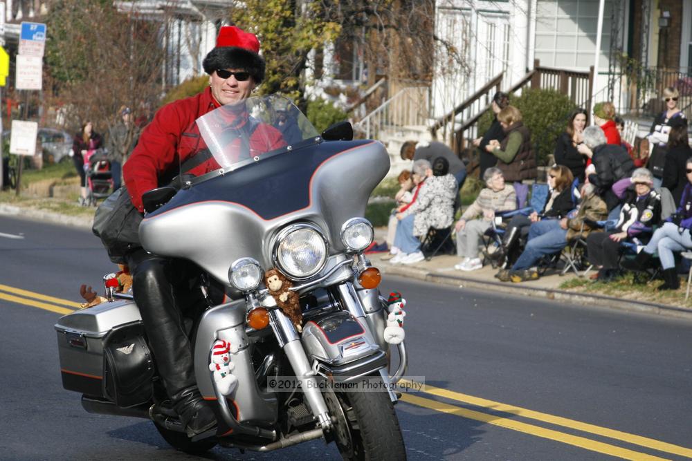 40th Annual Mayors Christmas Parade 2012\nPhotography by: Buckleman Photography\nall images ©2012 Buckleman Photography\nThe images displayed here are of low resolution;\nReprints available,  please contact us: \ngerard@bucklemanphotography.com\n410.608.7990\nbucklemanphotography.com\nFile Number - 2075.jpg