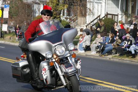 40th Annual Mayors Christmas Parade 2012\nPhotography by: Buckleman Photography\nall images ©2012 Buckleman Photography\nThe images displayed here are of low resolution;\nReprints available,  please contact us: \ngerard@bucklemanphotography.com\n410.608.7990\nbucklemanphotography.com\nFile Number - 2075.jpg