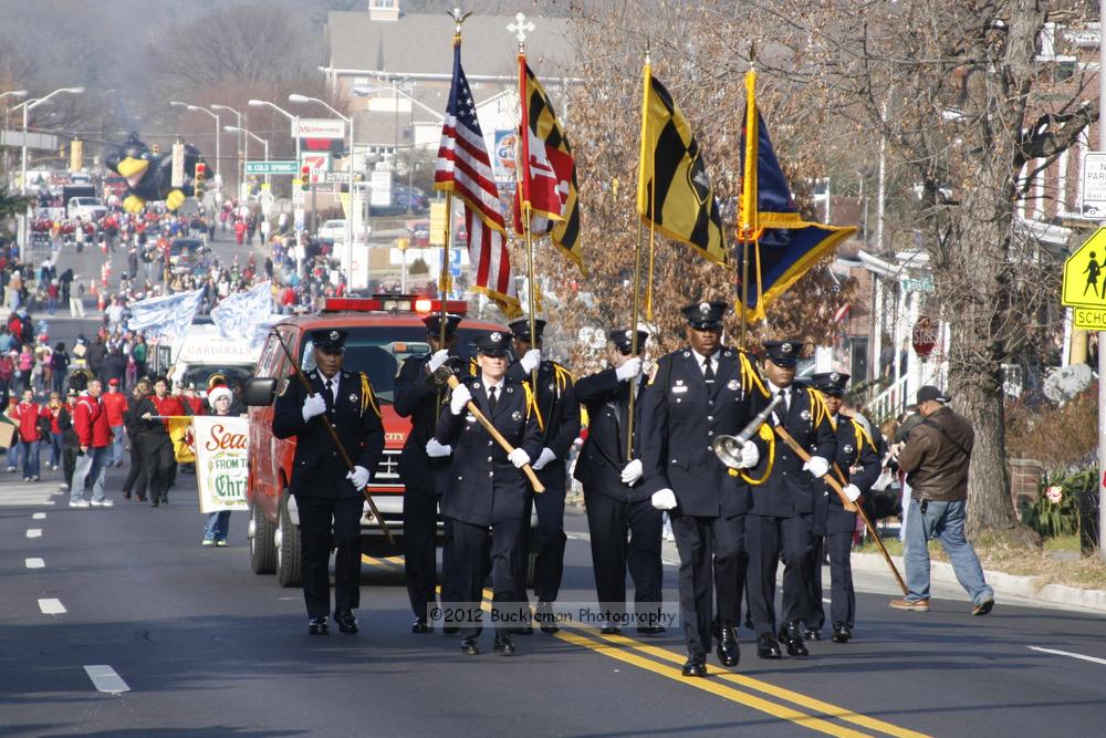 40th Annual Mayors Christmas Parade 2012\nPhotography by: Buckleman Photography\nall images ©2012 Buckleman Photography\nThe images displayed here are of low resolution;\nReprints available,  please contact us: \ngerard@bucklemanphotography.com\n410.608.7990\nbucklemanphotography.com\nFile Number - 2080.jpg