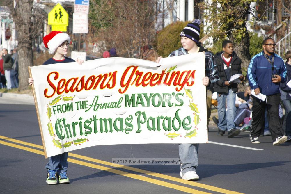 40th Annual Mayors Christmas Parade 2012\nPhotography by: Buckleman Photography\nall images ©2012 Buckleman Photography\nThe images displayed here are of low resolution;\nReprints available,  please contact us: \ngerard@bucklemanphotography.com\n410.608.7990\nbucklemanphotography.com\nFile Number - 2082.jpg