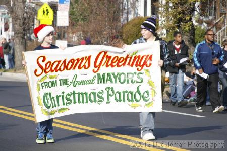 40th Annual Mayors Christmas Parade 2012\nPhotography by: Buckleman Photography\nall images ©2012 Buckleman Photography\nThe images displayed here are of low resolution;\nReprints available,  please contact us: \ngerard@bucklemanphotography.com\n410.608.7990\nbucklemanphotography.com\nFile Number - 2082.jpg