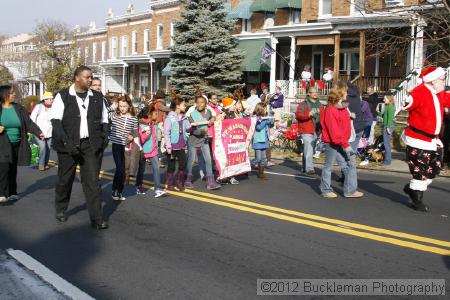 40th Annual Mayors Christmas Parade 2012\nPhotography by: Buckleman Photography\nall images ©2012 Buckleman Photography\nThe images displayed here are of low resolution;\nReprints available,  please contact us: \ngerard@bucklemanphotography.com\n410.608.7990\nbucklemanphotography.com\nFile Number - 2104.jpg