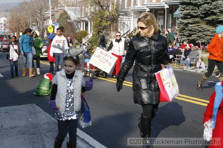 40th Annual Mayors Christmas Parade 2012\nPhotography by: Buckleman Photography\nall images ©2012 Buckleman Photography\nThe images displayed here are of low resolution;\nReprints available,  please contact us: \ngerard@bucklemanphotography.com\n410.608.7990\nbucklemanphotography.com\nFile Number - 2114.jpg