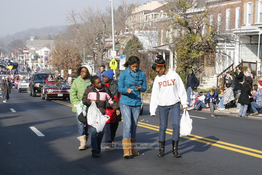 40th Annual Mayors Christmas Parade 2012\nPhotography by: Buckleman Photography\nall images ©2012 Buckleman Photography\nThe images displayed here are of low resolution;\nReprints available,  please contact us: \ngerard@bucklemanphotography.com\n410.608.7990\nbucklemanphotography.com\nFile Number - 2115.jpg