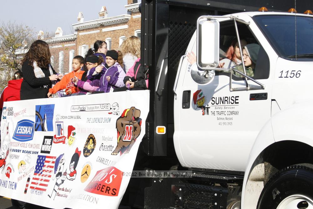 40th Annual Mayors Christmas Parade 2012\nPhotography by: Buckleman Photography\nall images ©2012 Buckleman Photography\nThe images displayed here are of low resolution;\nReprints available,  please contact us: \ngerard@bucklemanphotography.com\n410.608.7990\nbucklemanphotography.com\nFile Number - 2154.jpg