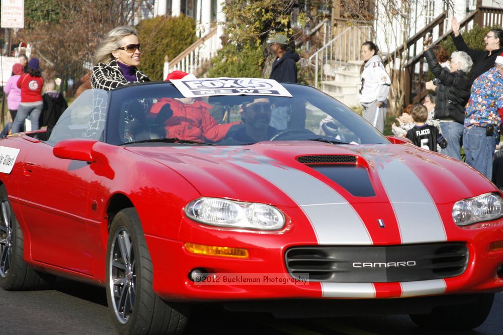 40th Annual Mayors Christmas Parade 2012\nPhotography by: Buckleman Photography\nall images ©2012 Buckleman Photography\nThe images displayed here are of low resolution;\nReprints available,  please contact us: \ngerard@bucklemanphotography.com\n410.608.7990\nbucklemanphotography.com\nFile Number - 2156.jpg