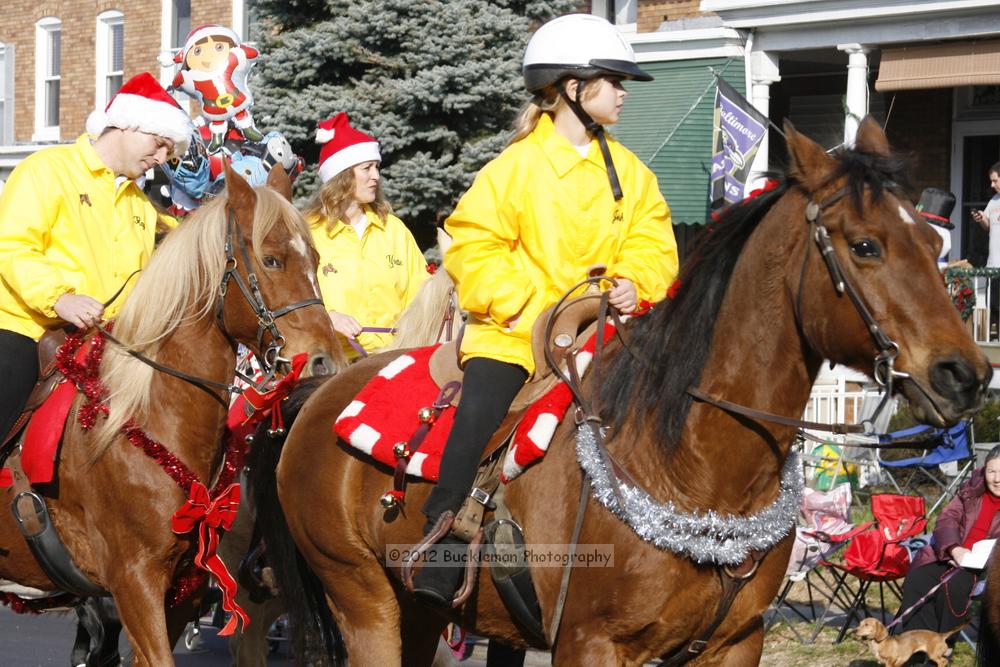 40th Annual Mayors Christmas Parade 2012\nPhotography by: Buckleman Photography\nall images ©2012 Buckleman Photography\nThe images displayed here are of low resolution;\nReprints available,  please contact us: \ngerard@bucklemanphotography.com\n410.608.7990\nbucklemanphotography.com\nFile Number - 2196.jpg