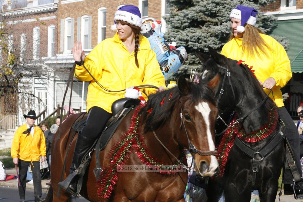 40th Annual Mayors Christmas Parade 2012\nPhotography by: Buckleman Photography\nall images ©2012 Buckleman Photography\nThe images displayed here are of low resolution;\nReprints available,  please contact us: \ngerard@bucklemanphotography.com\n410.608.7990\nbucklemanphotography.com\nFile Number - 2197.jpg