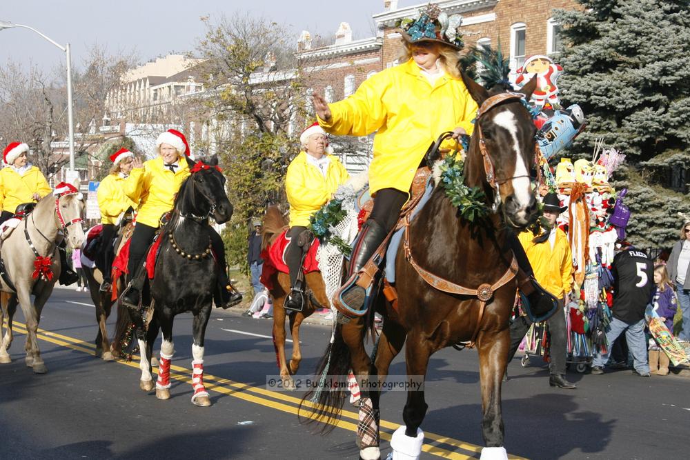 40th Annual Mayors Christmas Parade 2012\nPhotography by: Buckleman Photography\nall images ©2012 Buckleman Photography\nThe images displayed here are of low resolution;\nReprints available,  please contact us: \ngerard@bucklemanphotography.com\n410.608.7990\nbucklemanphotography.com\nFile Number - 2198.jpg