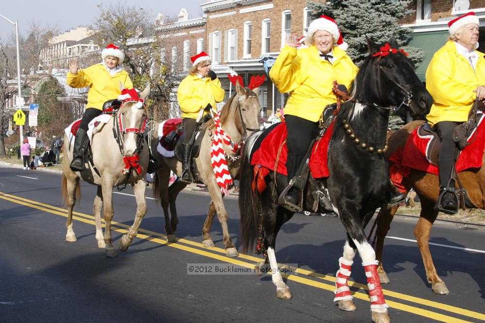 40th Annual Mayors Christmas Parade 2012\nPhotography by: Buckleman Photography\nall images ©2012 Buckleman Photography\nThe images displayed here are of low resolution;\nReprints available,  please contact us: \ngerard@bucklemanphotography.com\n410.608.7990\nbucklemanphotography.com\nFile Number - 2199.jpg