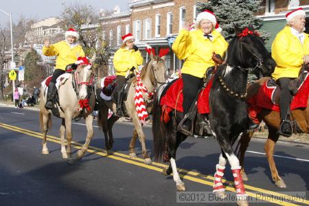 40th Annual Mayors Christmas Parade 2012\nPhotography by: Buckleman Photography\nall images ©2012 Buckleman Photography\nThe images displayed here are of low resolution;\nReprints available,  please contact us: \ngerard@bucklemanphotography.com\n410.608.7990\nbucklemanphotography.com\nFile Number - 2199.jpg