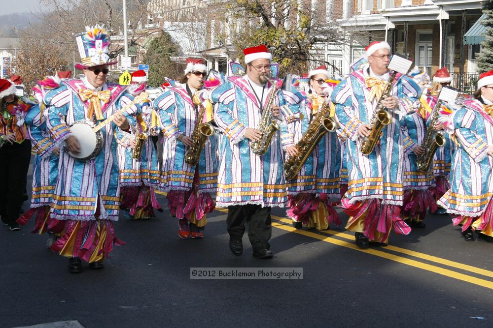 40th Annual Mayors Christmas Parade 2012\nPhotography by: Buckleman Photography\nall images ©2012 Buckleman Photography\nThe images displayed here are of low resolution;\nReprints available,  please contact us: \ngerard@bucklemanphotography.com\n410.608.7990\nbucklemanphotography.com\nFile Number - 2264.jpg