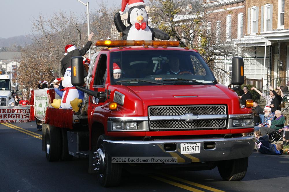 40th Annual Mayors Christmas Parade 2012\nPhotography by: Buckleman Photography\nall images ©2012 Buckleman Photography\nThe images displayed here are of low resolution;\nReprints available,  please contact us: \ngerard@bucklemanphotography.com\n410.608.7990\nbucklemanphotography.com\nFile Number - 2312.jpg