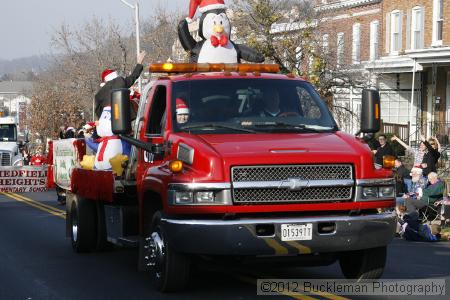 40th Annual Mayors Christmas Parade 2012\nPhotography by: Buckleman Photography\nall images ©2012 Buckleman Photography\nThe images displayed here are of low resolution;\nReprints available,  please contact us: \ngerard@bucklemanphotography.com\n410.608.7990\nbucklemanphotography.com\nFile Number - 2312.jpg