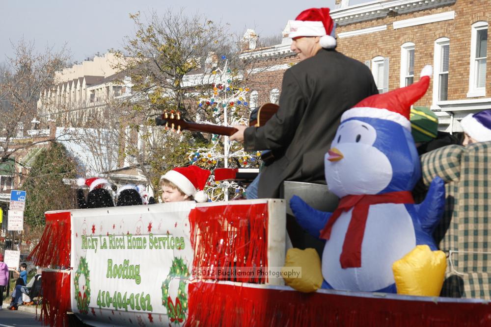 40th Annual Mayors Christmas Parade 2012\nPhotography by: Buckleman Photography\nall images ©2012 Buckleman Photography\nThe images displayed here are of low resolution;\nReprints available,  please contact us: \ngerard@bucklemanphotography.com\n410.608.7990\nbucklemanphotography.com\nFile Number - 2313.jpg