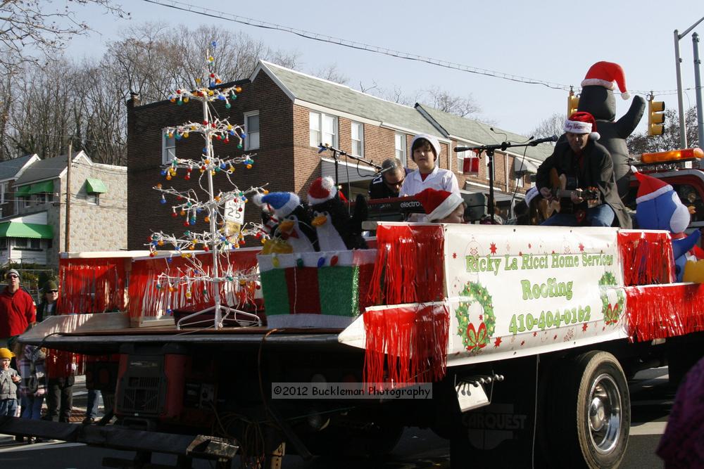 40th Annual Mayors Christmas Parade 2012\nPhotography by: Buckleman Photography\nall images ©2012 Buckleman Photography\nThe images displayed here are of low resolution;\nReprints available,  please contact us: \ngerard@bucklemanphotography.com\n410.608.7990\nbucklemanphotography.com\nFile Number - 2315.jpg