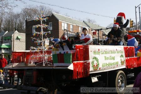 40th Annual Mayors Christmas Parade 2012\nPhotography by: Buckleman Photography\nall images ©2012 Buckleman Photography\nThe images displayed here are of low resolution;\nReprints available,  please contact us: \ngerard@bucklemanphotography.com\n410.608.7990\nbucklemanphotography.com\nFile Number - 2315.jpg