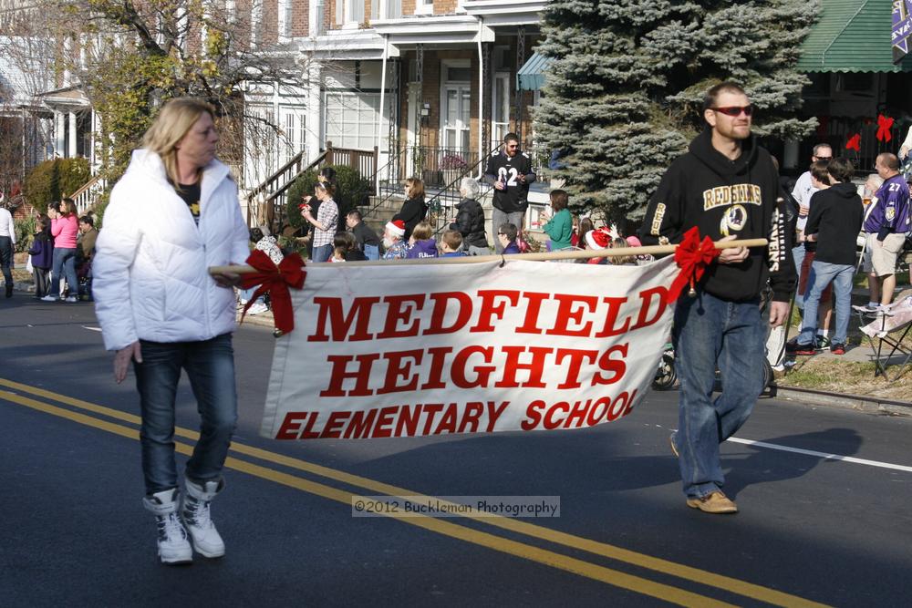 40th Annual Mayors Christmas Parade 2012\nPhotography by: Buckleman Photography\nall images ©2012 Buckleman Photography\nThe images displayed here are of low resolution;\nReprints available,  please contact us: \ngerard@bucklemanphotography.com\n410.608.7990\nbucklemanphotography.com\nFile Number - 2316.jpg