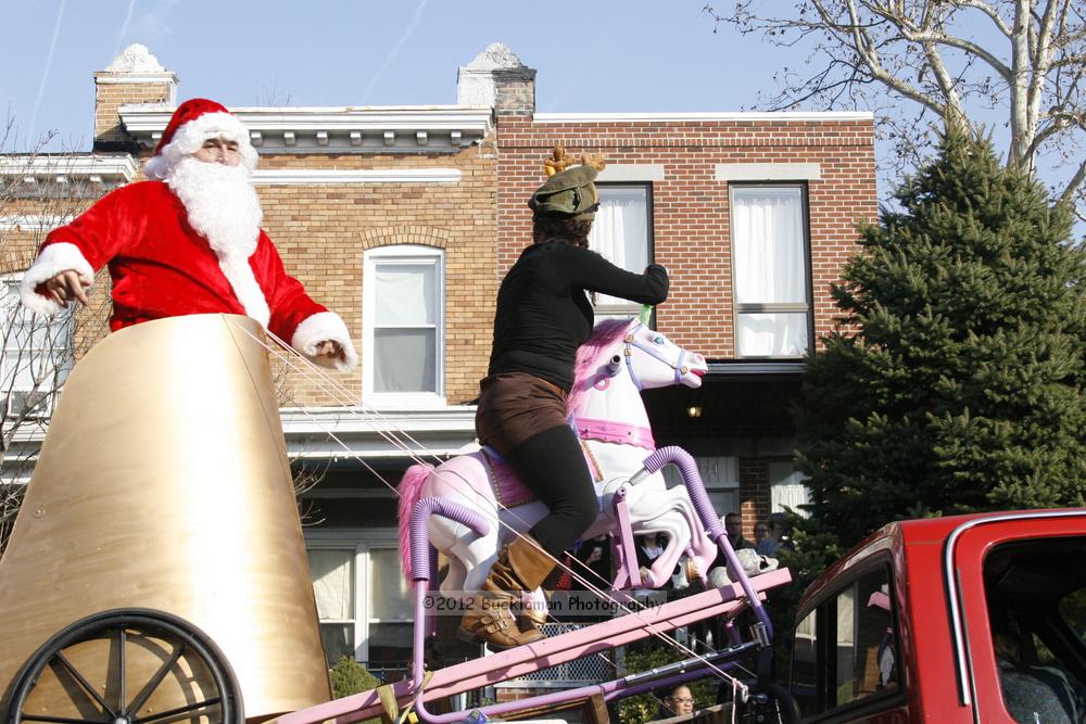 40th Annual Mayors Christmas Parade 2012\nPhotography by: Buckleman Photography\nall images ©2012 Buckleman Photography\nThe images displayed here are of low resolution;\nReprints available,  please contact us: \ngerard@bucklemanphotography.com\n410.608.7990\nbucklemanphotography.com\nFile Number - 2337.jpg