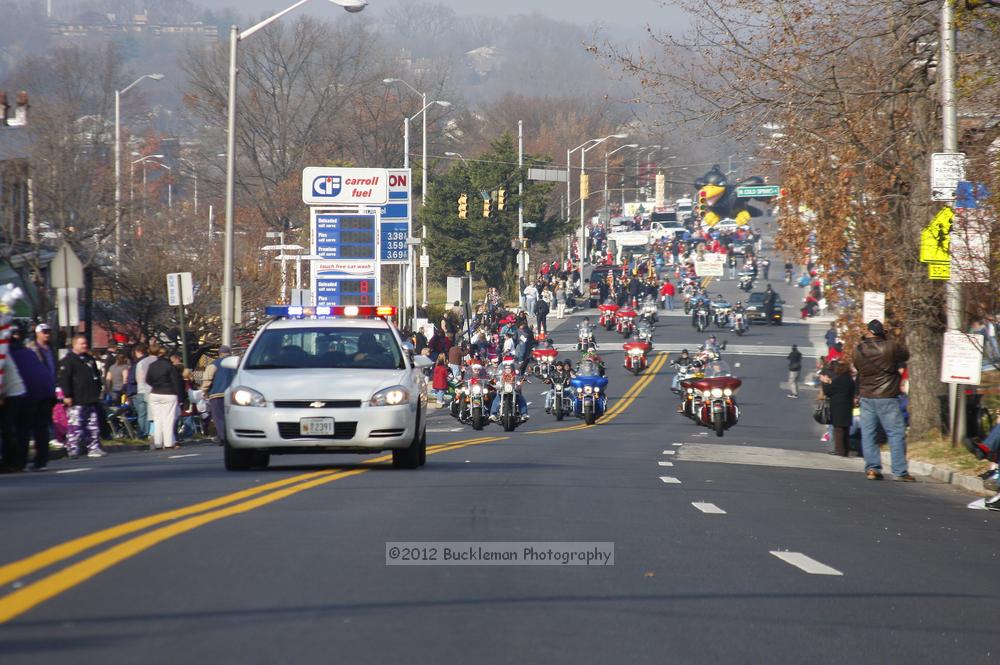 40th Annual Mayors Christmas Parade 2012\nPhotography by: Buckleman Photography\nall images ©2012 Buckleman Photography\nThe images displayed here are of low resolution;\nReprints available,  please contact us: \ngerard@bucklemanphotography.com\n410.608.7990\nbucklemanphotography.com\nFile Number - 5349.jpg