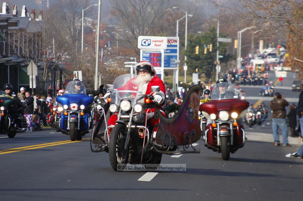 40th Annual Mayors Christmas Parade 2012\nPhotography by: Buckleman Photography\nall images ©2012 Buckleman Photography\nThe images displayed here are of low resolution;\nReprints available,  please contact us: \ngerard@bucklemanphotography.com\n410.608.7990\nbucklemanphotography.com\nFile Number - 5352.jpg