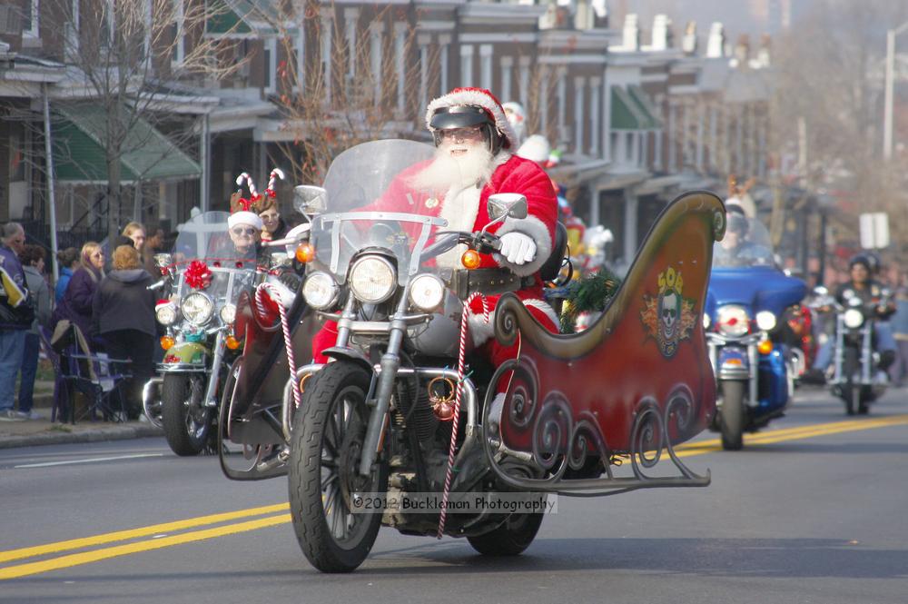 40th Annual Mayors Christmas Parade 2012\nPhotography by: Buckleman Photography\nall images ©2012 Buckleman Photography\nThe images displayed here are of low resolution;\nReprints available,  please contact us: \ngerard@bucklemanphotography.com\n410.608.7990\nbucklemanphotography.com\nFile Number - 5354.jpg