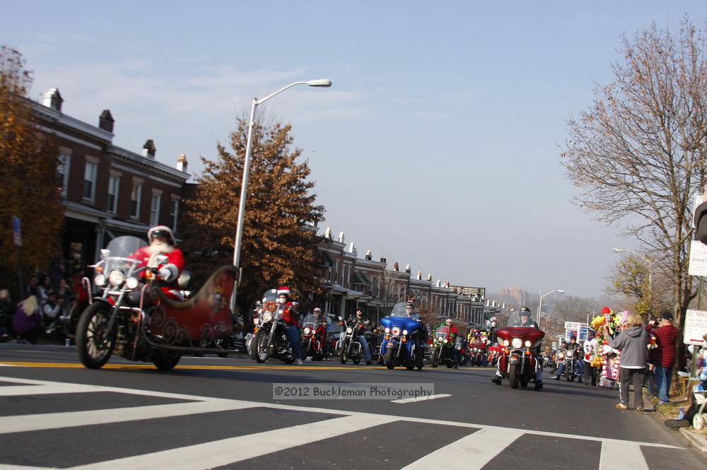 40th Annual Mayors Christmas Parade 2012\nPhotography by: Buckleman Photography\nall images ©2012 Buckleman Photography\nThe images displayed here are of low resolution;\nReprints available,  please contact us: \ngerard@bucklemanphotography.com\n410.608.7990\nbucklemanphotography.com\nFile Number - 5357.jpg