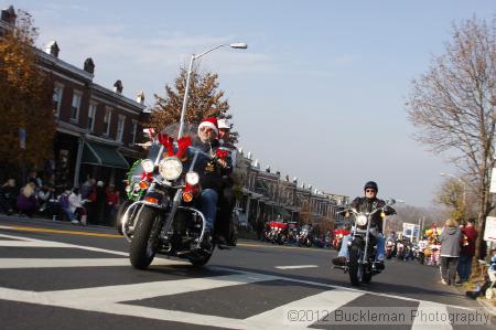 40th Annual Mayors Christmas Parade 2012\nPhotography by: Buckleman Photography\nall images ©2012 Buckleman Photography\nThe images displayed here are of low resolution;\nReprints available,  please contact us: \ngerard@bucklemanphotography.com\n410.608.7990\nbucklemanphotography.com\nFile Number - 5360.jpg