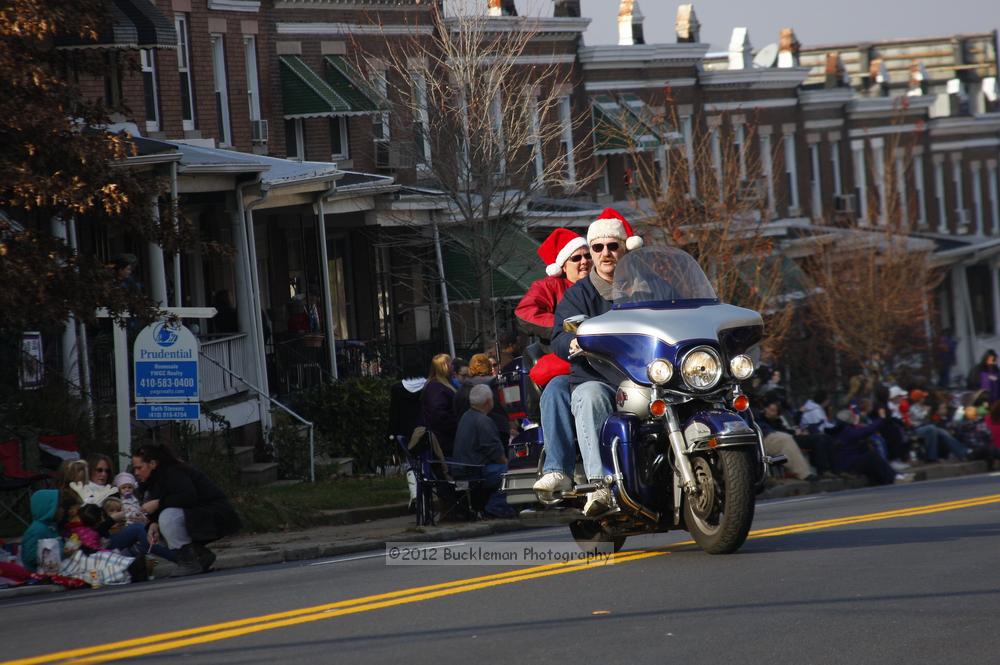 40th Annual Mayors Christmas Parade 2012\nPhotography by: Buckleman Photography\nall images ©2012 Buckleman Photography\nThe images displayed here are of low resolution;\nReprints available,  please contact us: \ngerard@bucklemanphotography.com\n410.608.7990\nbucklemanphotography.com\nFile Number - 5367.jpg