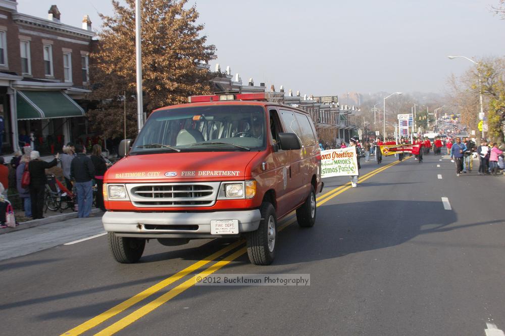 40th Annual Mayors Christmas Parade 2012\nPhotography by: Buckleman Photography\nall images ©2012 Buckleman Photography\nThe images displayed here are of low resolution;\nReprints available,  please contact us: \ngerard@bucklemanphotography.com\n410.608.7990\nbucklemanphotography.com\nFile Number - 5374.jpg