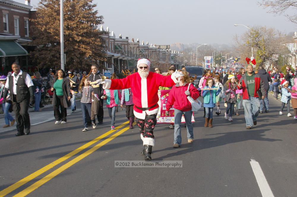 40th Annual Mayors Christmas Parade 2012\nPhotography by: Buckleman Photography\nall images ©2012 Buckleman Photography\nThe images displayed here are of low resolution;\nReprints available,  please contact us: \ngerard@bucklemanphotography.com\n410.608.7990\nbucklemanphotography.com\nFile Number - 5394.jpg