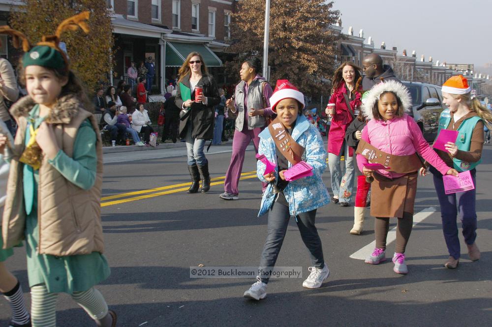 40th Annual Mayors Christmas Parade 2012\nPhotography by: Buckleman Photography\nall images ©2012 Buckleman Photography\nThe images displayed here are of low resolution;\nReprints available,  please contact us: \ngerard@bucklemanphotography.com\n410.608.7990\nbucklemanphotography.com\nFile Number - 5398.jpg