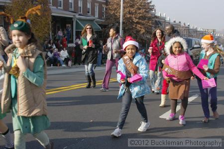 40th Annual Mayors Christmas Parade 2012\nPhotography by: Buckleman Photography\nall images ©2012 Buckleman Photography\nThe images displayed here are of low resolution;\nReprints available,  please contact us: \ngerard@bucklemanphotography.com\n410.608.7990\nbucklemanphotography.com\nFile Number - 5398.jpg