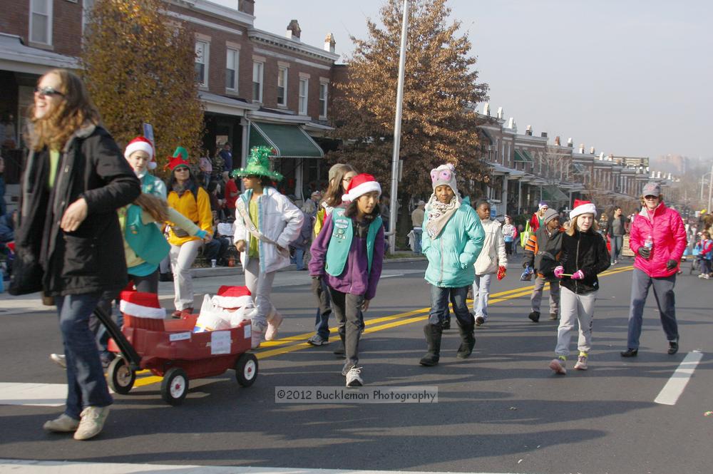 40th Annual Mayors Christmas Parade 2012\nPhotography by: Buckleman Photography\nall images ©2012 Buckleman Photography\nThe images displayed here are of low resolution;\nReprints available,  please contact us: \ngerard@bucklemanphotography.com\n410.608.7990\nbucklemanphotography.com\nFile Number - 5405.jpg