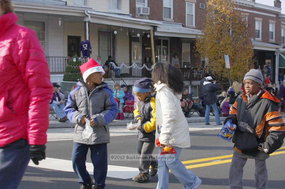 40th Annual Mayors Christmas Parade 2012\nPhotography by: Buckleman Photography\nall images ©2012 Buckleman Photography\nThe images displayed here are of low resolution;\nReprints available,  please contact us: \ngerard@bucklemanphotography.com\n410.608.7990\nbucklemanphotography.com\nFile Number - 5407.jpg