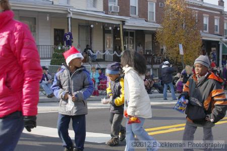 40th Annual Mayors Christmas Parade 2012\nPhotography by: Buckleman Photography\nall images ©2012 Buckleman Photography\nThe images displayed here are of low resolution;\nReprints available,  please contact us: \ngerard@bucklemanphotography.com\n410.608.7990\nbucklemanphotography.com\nFile Number - 5407.jpg