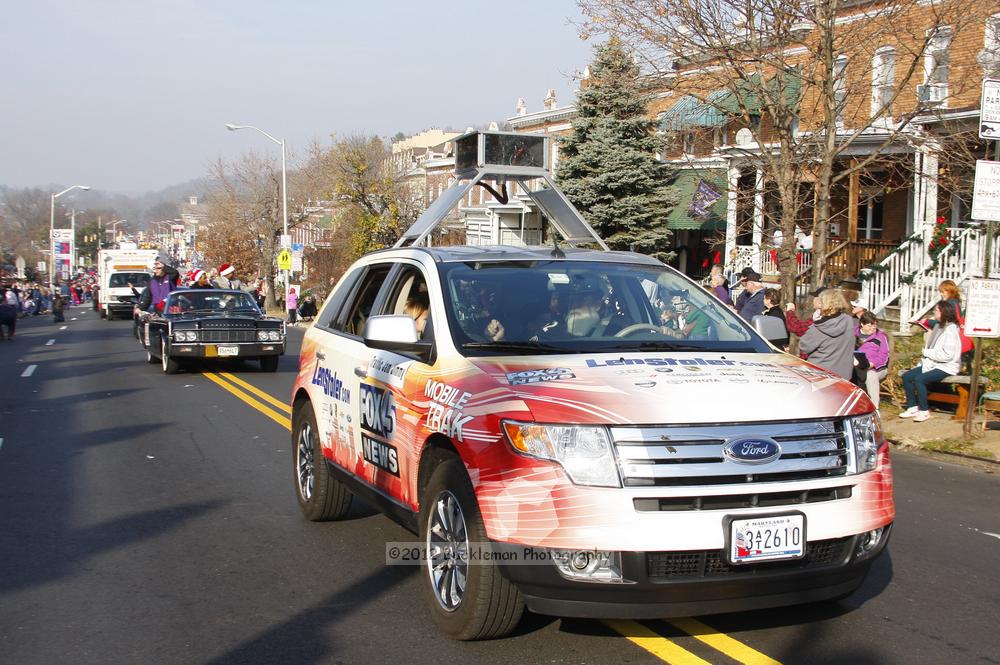 40th Annual Mayors Christmas Parade 2012\nPhotography by: Buckleman Photography\nall images ©2012 Buckleman Photography\nThe images displayed here are of low resolution;\nReprints available,  please contact us: \ngerard@bucklemanphotography.com\n410.608.7990\nbucklemanphotography.com\nFile Number - 5461.jpg