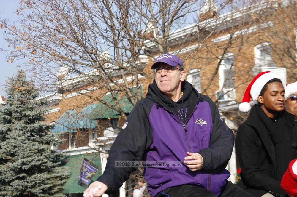 40th Annual Mayors Christmas Parade 2012\nPhotography by: Buckleman Photography\nall images ©2012 Buckleman Photography\nThe images displayed here are of low resolution;\nReprints available,  please contact us: \ngerard@bucklemanphotography.com\n410.608.7990\nbucklemanphotography.com\nFile Number - 5463.jpg