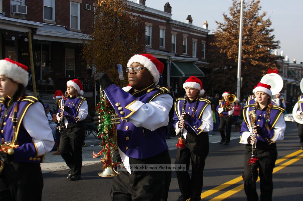 40th Annual Mayors Christmas Parade 2012\nPhotography by: Buckleman Photography\nall images ©2012 Buckleman Photography\nThe images displayed here are of low resolution;\nReprints available,  please contact us: \ngerard@bucklemanphotography.com\n410.608.7990\nbucklemanphotography.com\nFile Number - 5488.jpg