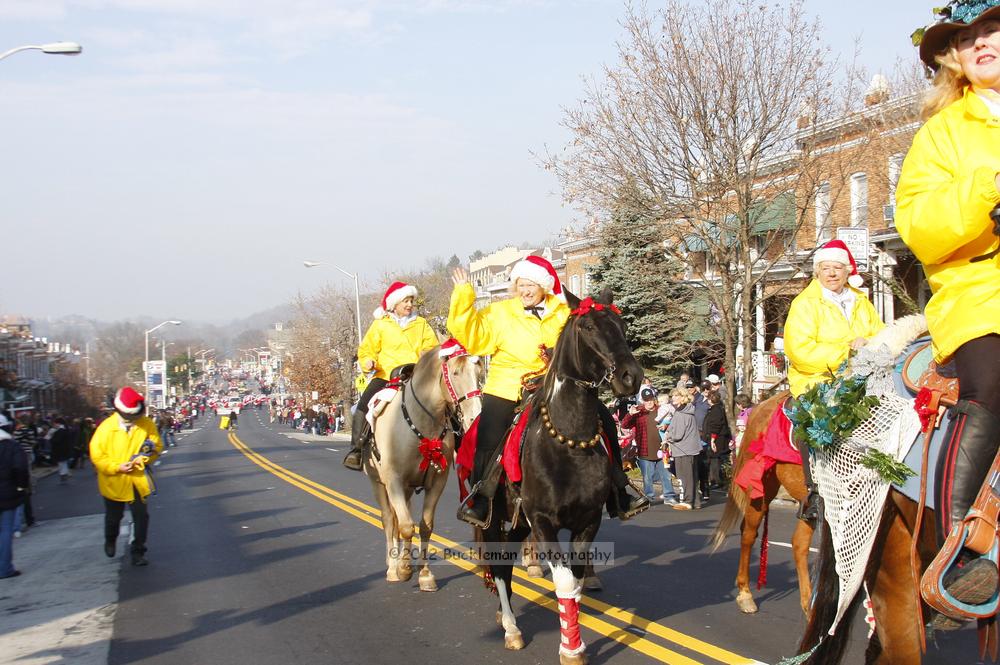 40th Annual Mayors Christmas Parade 2012\nPhotography by: Buckleman Photography\nall images ©2012 Buckleman Photography\nThe images displayed here are of low resolution;\nReprints available,  please contact us: \ngerard@bucklemanphotography.com\n410.608.7990\nbucklemanphotography.com\nFile Number - 5530.jpg